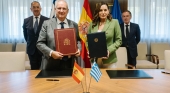 Hereu y Kefalogianni durante la firma del memorando