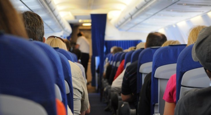 flying people sitting public transportation