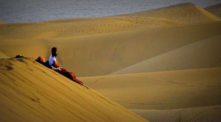 Turistas en las dunas de Maspalomas
