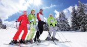 Esquiadores en los Alpes